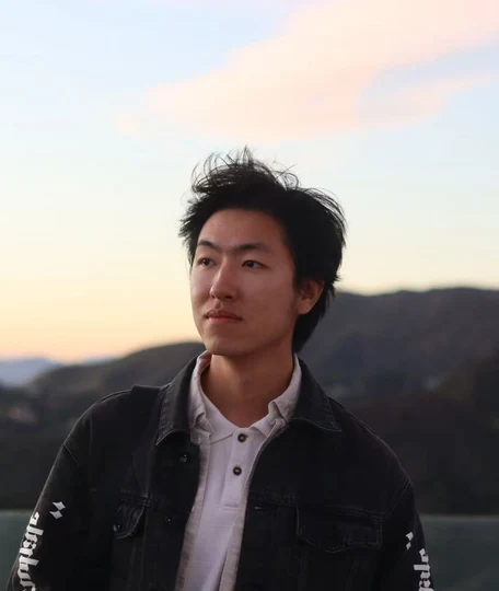 Ziang Fu outdoors at sunset